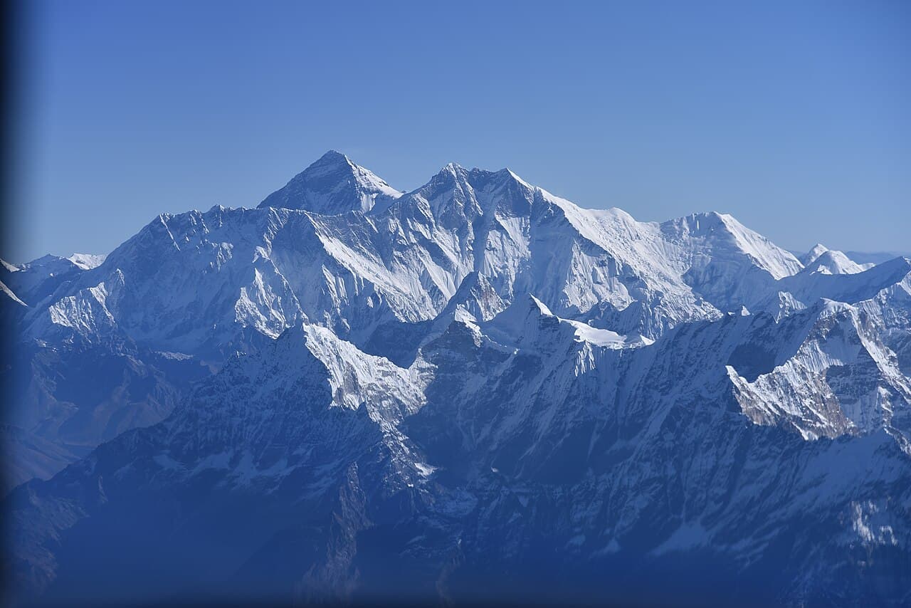 Everest seen through the window of a Buddha Air scenic mountain flight