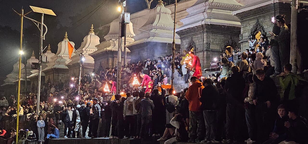 Devotees and lamps during evening Aarti at Pashupatinath Temple
