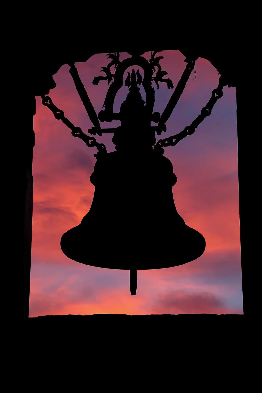 The bell at Patan Durbar Square at dusk