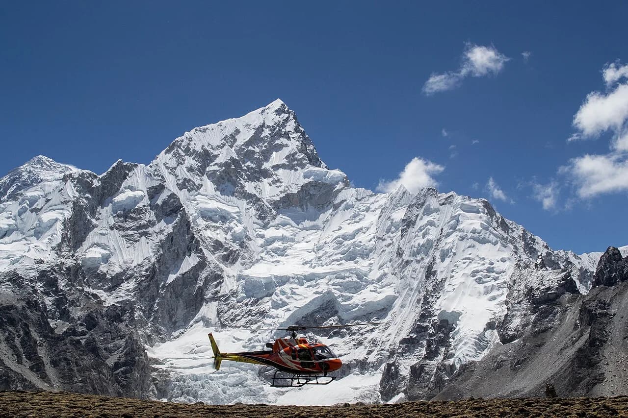 A helicopter in the Everest region; illustrative view, not a promised landing